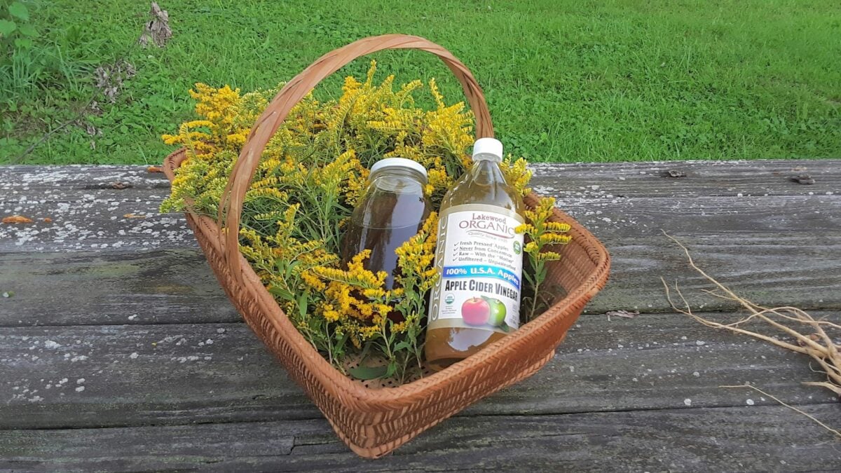 Goldenrod, honey and apple cider vinegar in a basket.