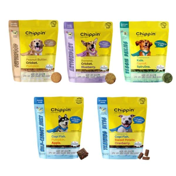 Five bags of Chippin dog treat varieties.