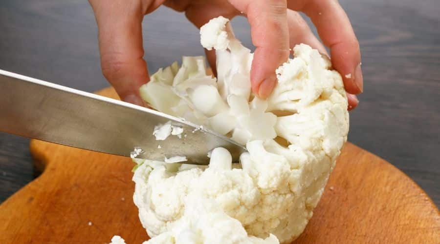 Chopping head of cauliflower