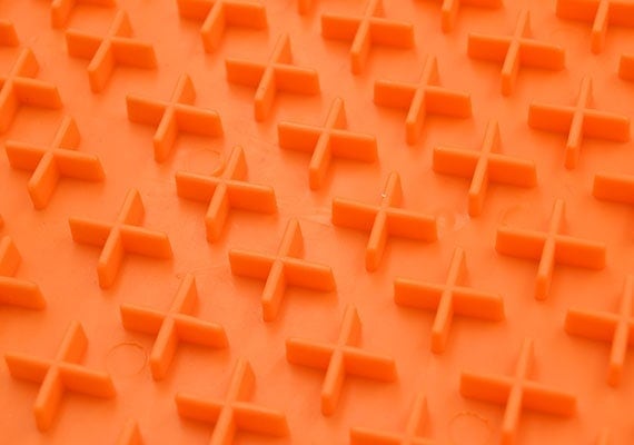 Close up ojn Hyper Pet Lickimat Buddy orange lick mat