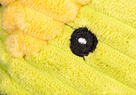 Close up on corduroy like material on HuggleHounds Knotties duck plush toy for dogs