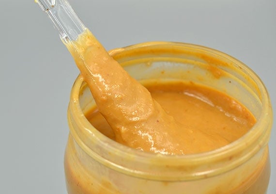 Close up on peanut butter thickness test 365 everyday value organic creamy peanut butter