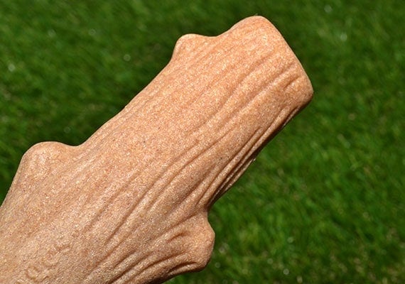 Close up on Petstages Dogwood reveals compressed wooden sawdust inside