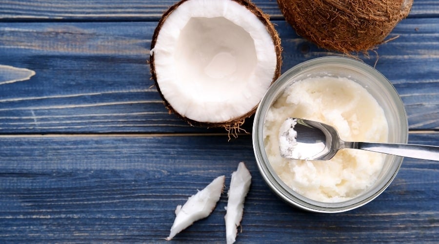 Coconut paste and coconut on a table.