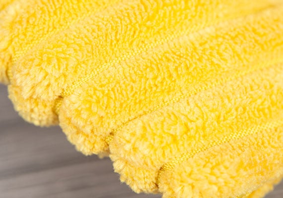 Extra heavy duty stitching on the foot of a dog-proof plush toy