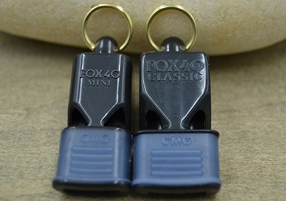 Fox 40 CMG Mini and Fox 40 CMG Classic compared side by side.