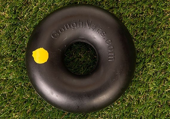 Goughnuts Indestructible Chew Ring on grass.