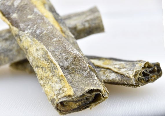 Individual Pieces of Savory Prime Cod Skin Fish Strips Treats For Dogs