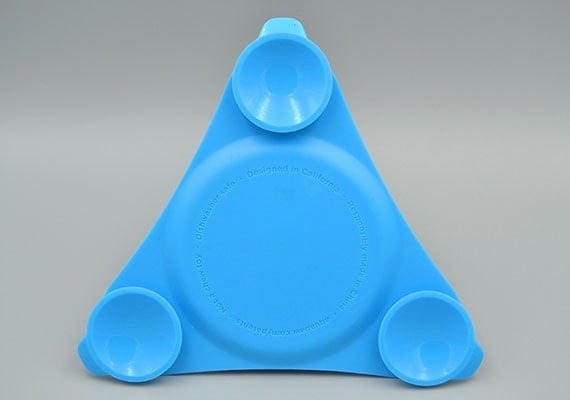 Rear of Aquapaw Slow Treater lick mat with three suction cups for attaching it to tiles and glass