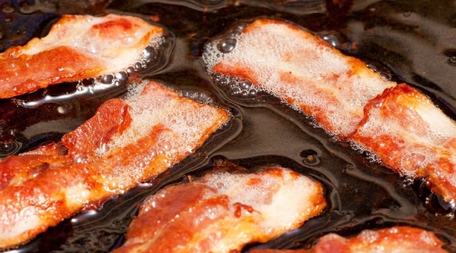 Sliced Pork Meat Frying in Oil