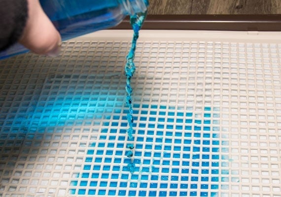 Testing the Richell Paw Trax Mesh Training Tray with urine simulation
