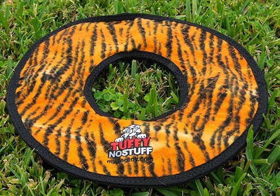 Tuffy stuffing-free tug ring for puppies in grass 