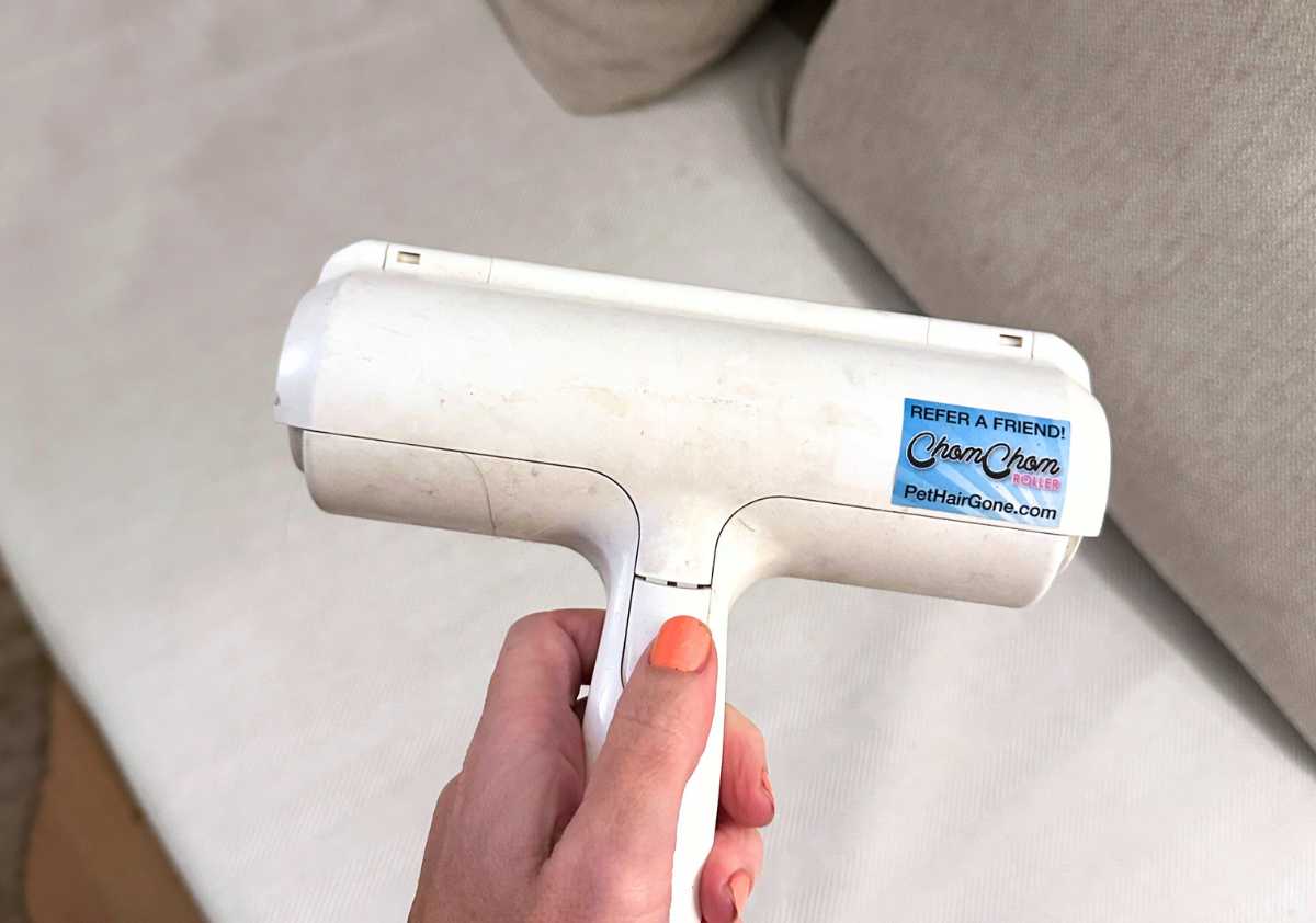 ChomChom roller on sofa.