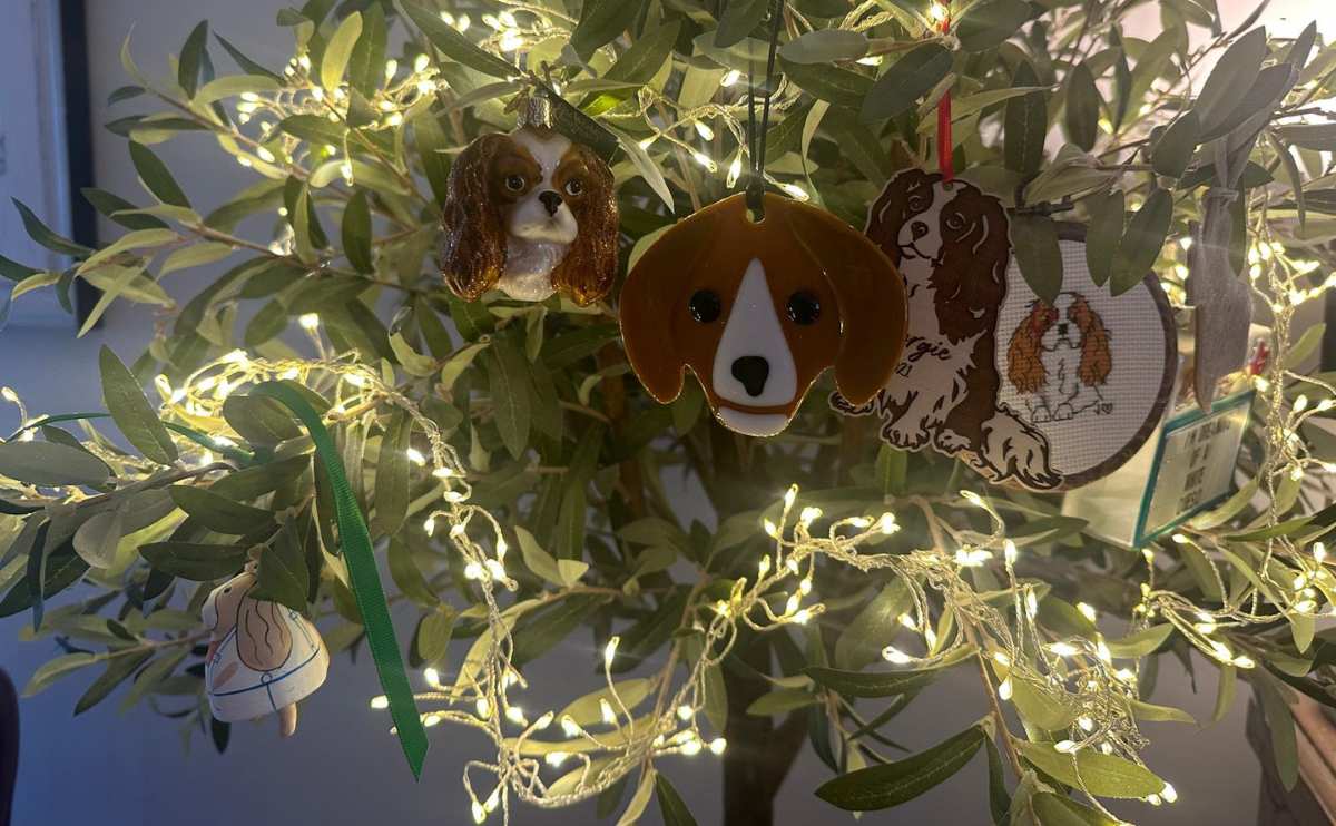 Christmas tree with dog ornaments.