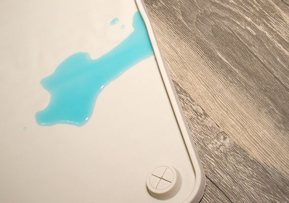 Example of Wee Wee Silicone Pad Holder containing Urine if pee pad leaks