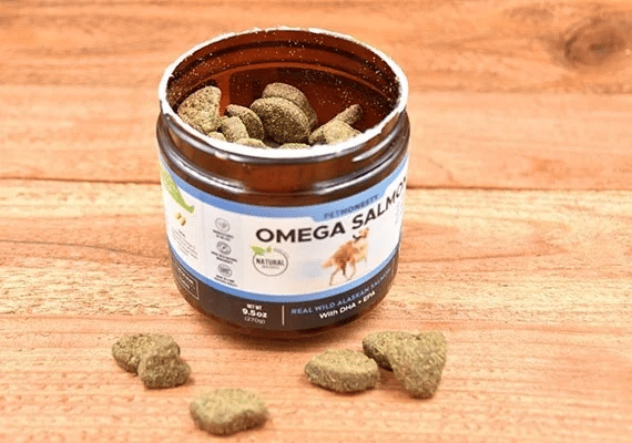 Pet Honesty Skin Health Salmon bites and container on the counter.
