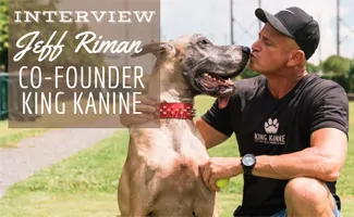 Jeff Riman kissing his Great Dane Mojo (Caption: Interview Jeff Riman Co-Founder King Kanine)