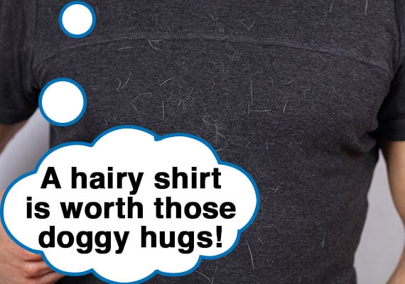 Man wearing shirt covered in dog hair