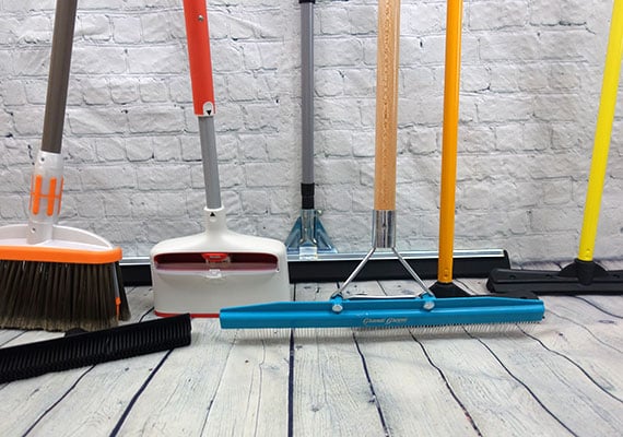 Some of the different dog hair brooms we tested and reviewed