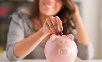 Woman Saving Money in piggy bank