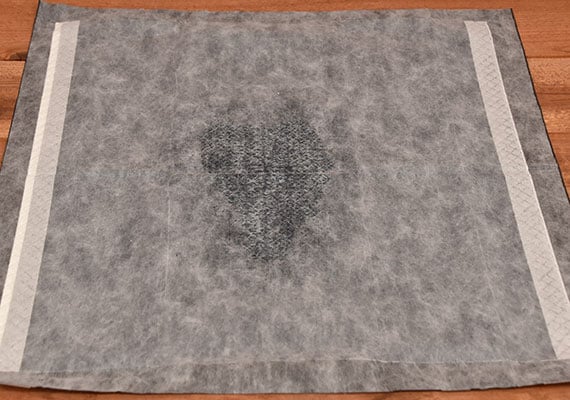 Dog urine in barely noticible in the middle of bulldogology - winner of best premium pee pad for dogs